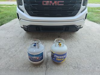 Two full propane tanks 15lbs each