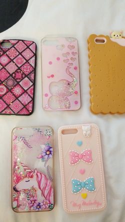 Barely used I Phone 7 phone case packages. 5 exciting themes
