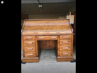 Beautiful 1950’s antique solid wood roll top desk.