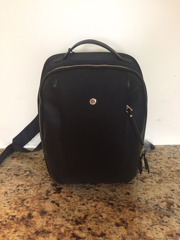 Travanti Black An Gold Backpack for Sale in Chicago, IL - OfferUp