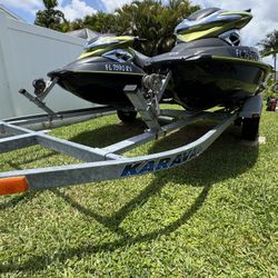Pair Of Sea Doo Jet Skis W Trailer