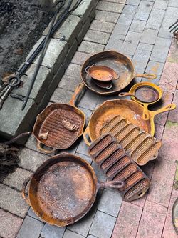 Pile of cast iron pans