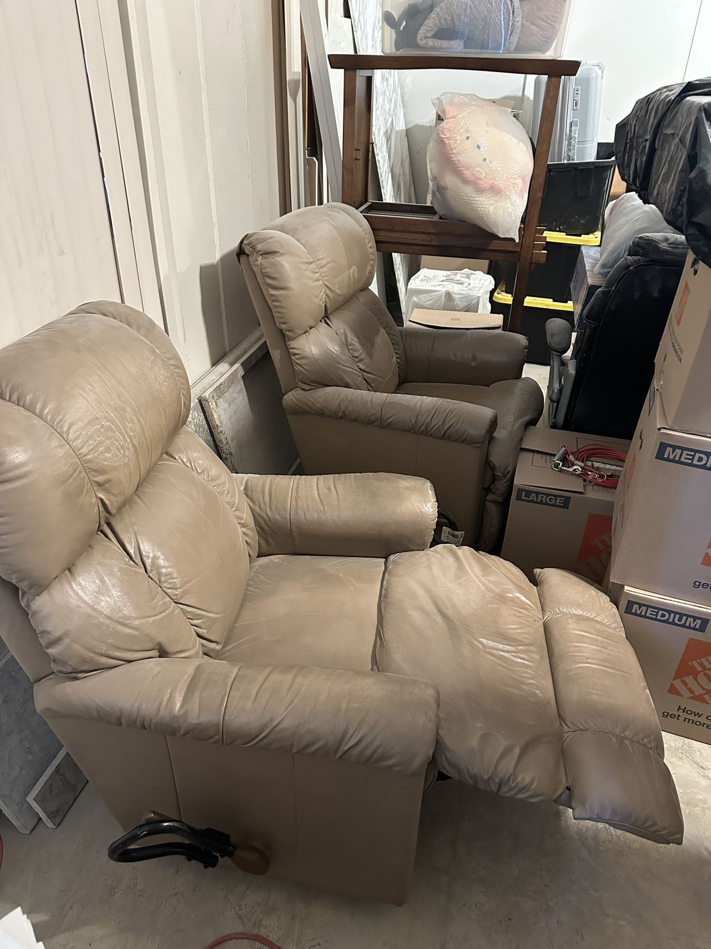 Two Leather Reclining Chairs