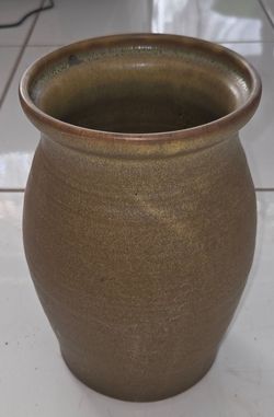 Vintage heavy hand‑thrown stoneware pottery crock vase, 9" tall, 7" diameter. Earthy brown‑olive glaze, thick sturdy pottery. No chips, no cracks, hol