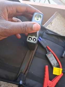 Portable Jump Starter with Built-In FlashlightPortable jumper cables.