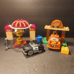 LEGO DUPLO: Mater's Yard 5814 & Mega Bloks 7767 Disney Pixar Cars Piston Cup