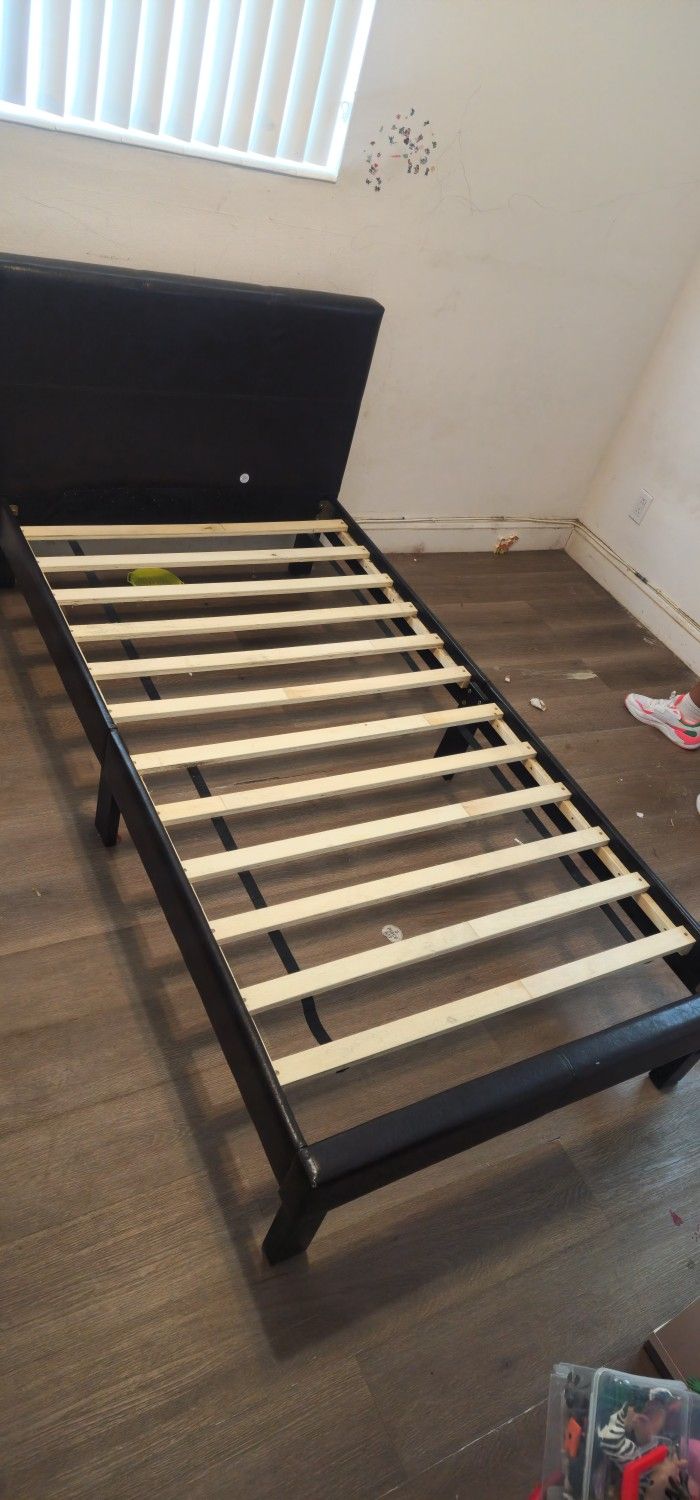 2 Twin Bed Frames One With Tundrel