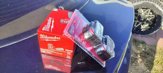 Brand new Milwaukee M18 orbit sander with two brand new 5.0 M18 Milwaukee batteries