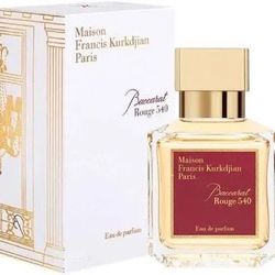 Maison Francis Kurkdjian Baccarat Rouge 540 Eau de Parfum. Luxurious fragrance in a clear bottle with a gold cap and red label.