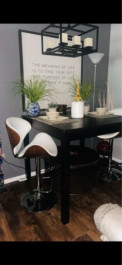 Used IKEA Bjursta bar table in good condition. Brown-Black veneer