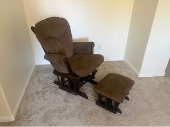 Brown glider chair with ottoman
