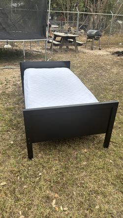 Twin bed frame with mattress