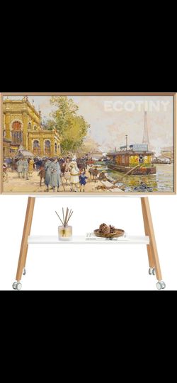 Rolling Easel TV Stand for 49-75" TVs, 88 lbs, White
Wood-and-metal mobile TV cart, locking 360°