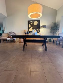 Extendable Dining Table with Built-In Leaf – $300