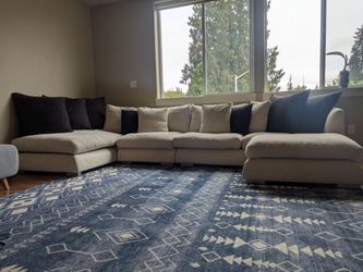 140" Ivory sectional, used in good condition