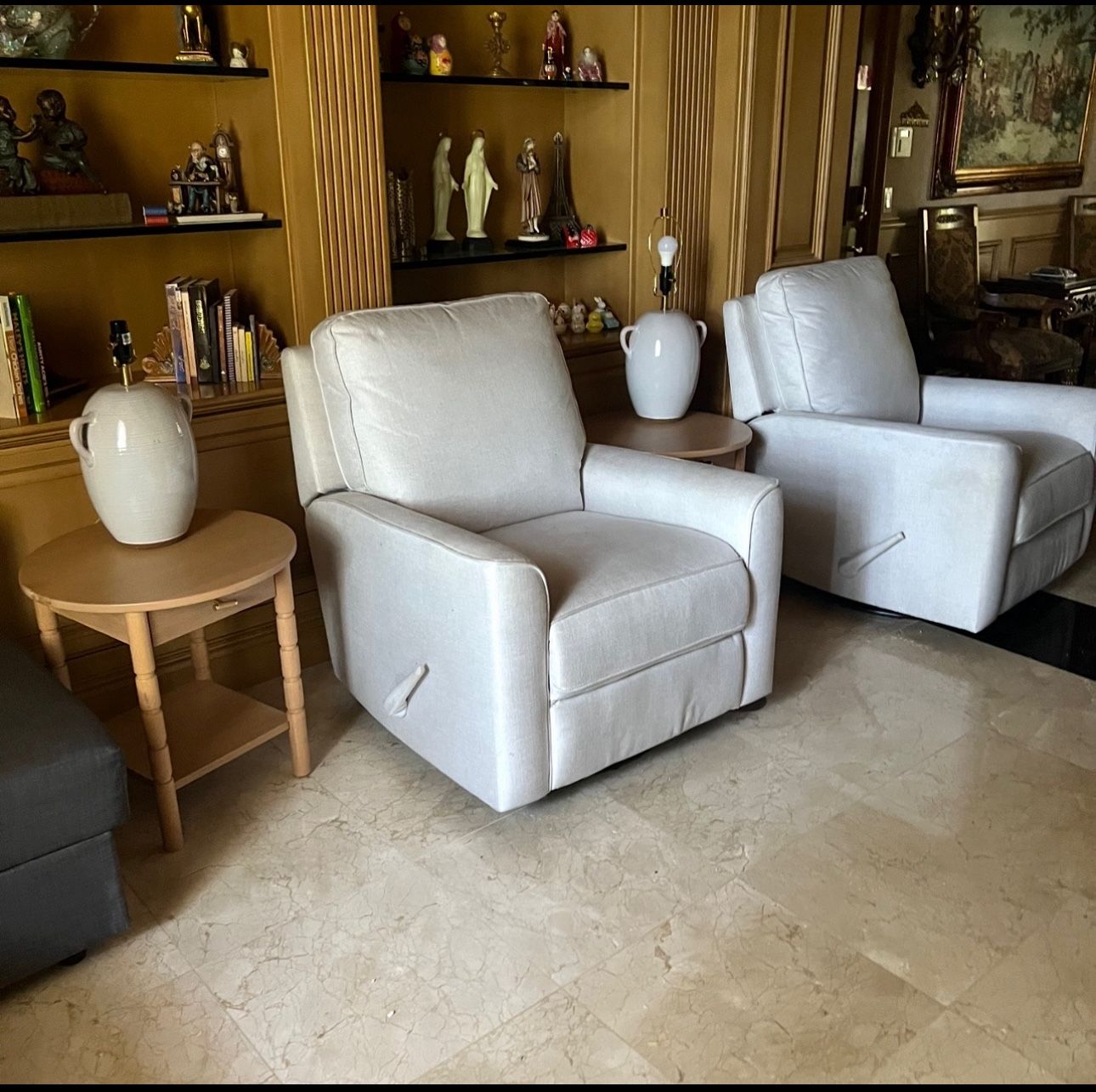 2 Recliners Swivel And Reclines High End