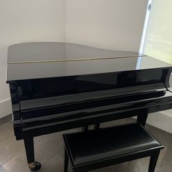 Baby grand piano For sale 