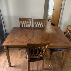 Genuine Heavy Wood Table And Chairs  