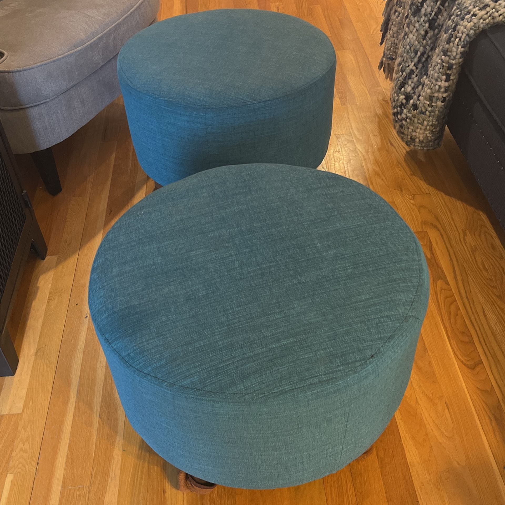 Pair Of Turquoise Upholstered Ottomans