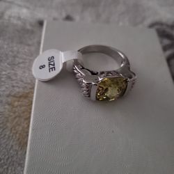 SILVER RING SIZE 8 WITH YELLOW STONE