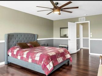 Queen bed with mattress and nightstand
