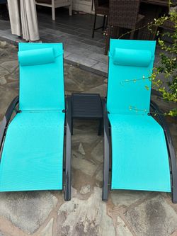 Lounge chairs with tables