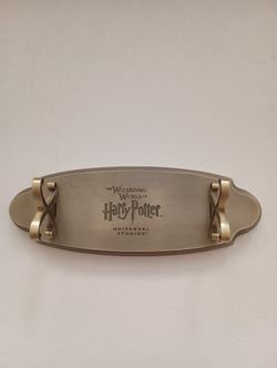 Universal Studios Wizard Movie Holds Harry Potter Wand