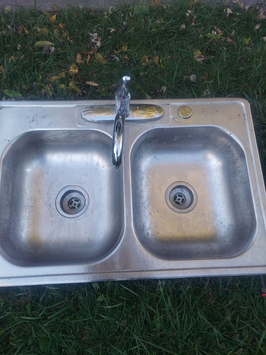 kitchen sink with faucet