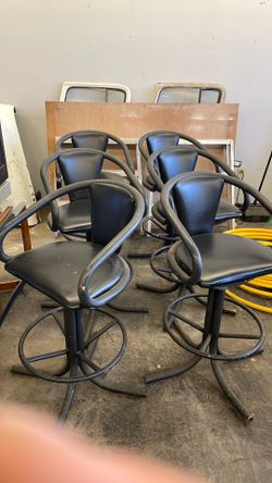 Swiveling Bar Chairs. 