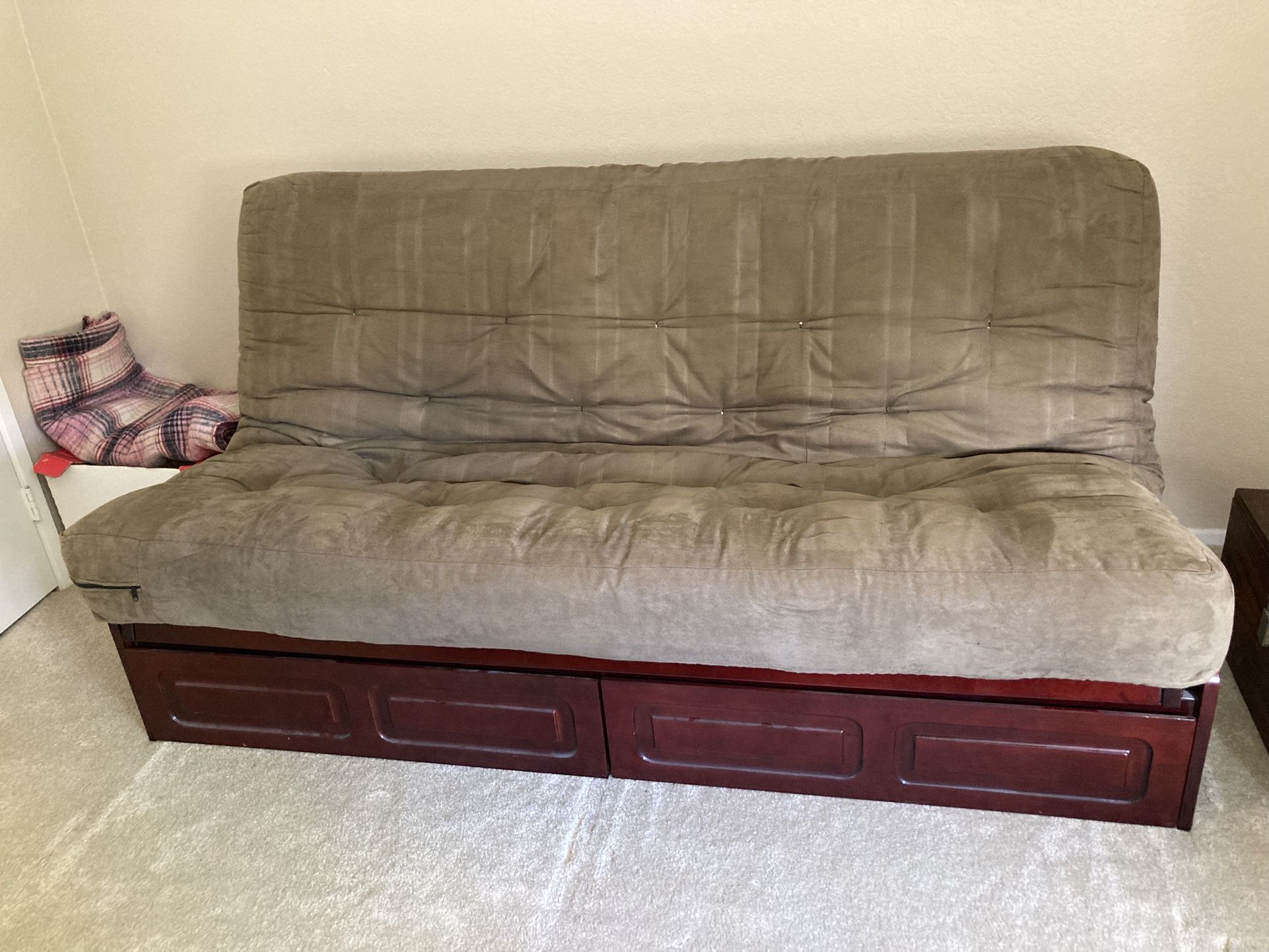 Cherry wood futon sofa/bed with drawers.