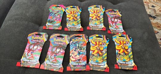 Pokémona TCG: Mega Evolution—Chaos Rising Sleeved Booster Packs.