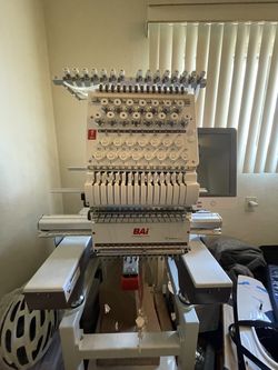 BAI Mirror is a 15 needle Embroidery Machine