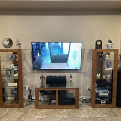 Beautiful Wood And glass entertainment center