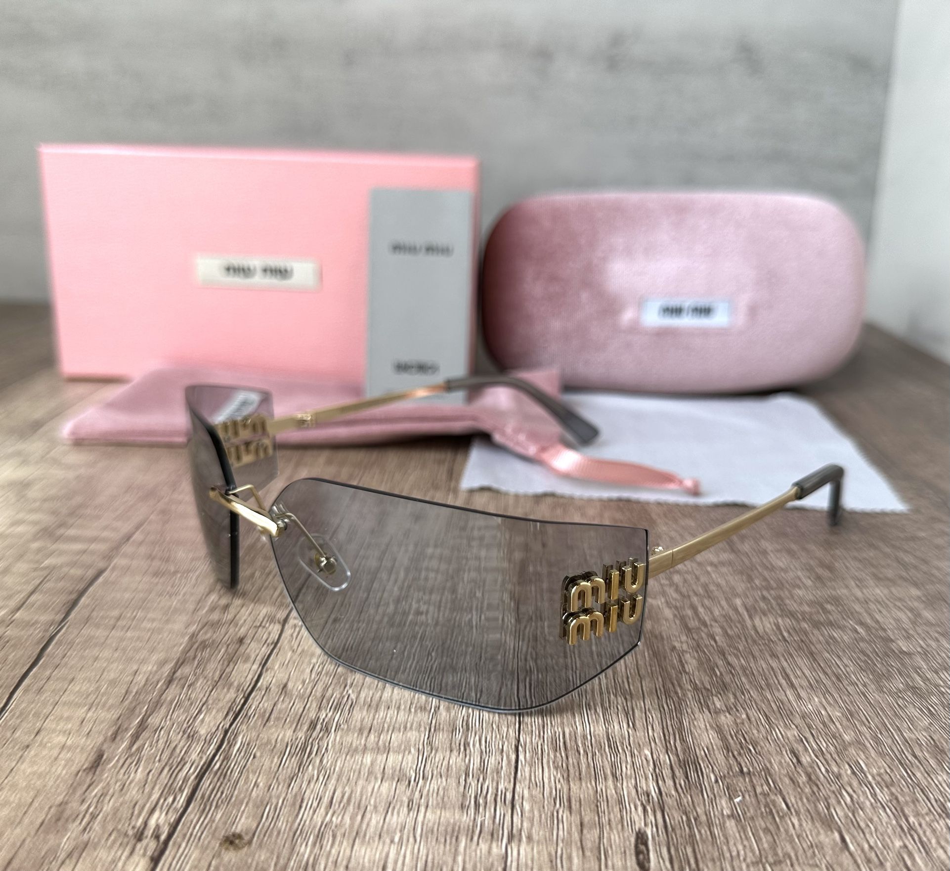 Miu Miu Sunglasses Blue Lens