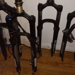 Variety Of Mountains Bike Forks With Disc Rotors