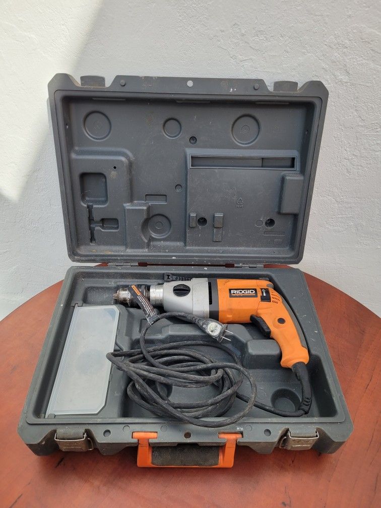 Ridgid Drill with box. Tool for construction and carpentry work. Taladro en su caja
