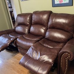 Leather couch, TV stand and TV