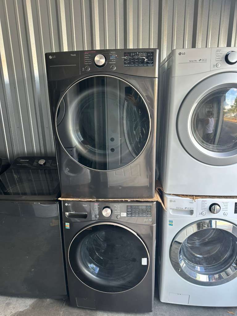 LG stackable front-loading washer and dryer combo set in black steel