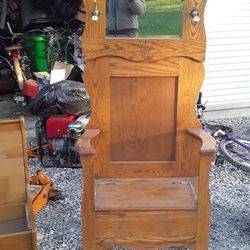 A Chair With A Coat Rack And A Cubby To Store Stuff With Another Bench With Another Cubby Store More Stuff