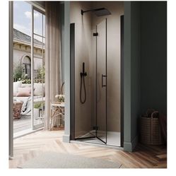 Matte Black Bifold Shower Door  36W x 72H  Able to adjust .75in each side to expand  New sealed packaging  $260