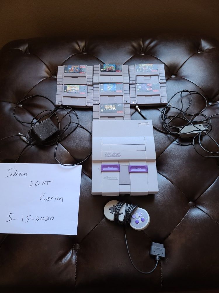 Excellent condition Super Nintendo with 7 games and original Nintendo wires and 1 original Snes controller