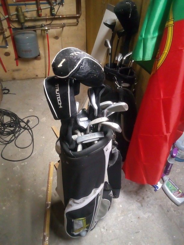 2 Sets of Golf Clubs