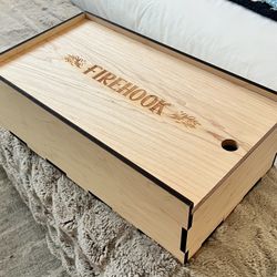 a custom wood packaging gift box manufactured by Woodchuck USA.