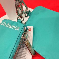 Lululemon aqua dual wristlet