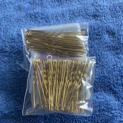 New - approximately 75 Gold hairpins
