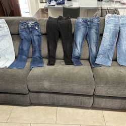 9 Pairs Girls size 10-12 jeans
