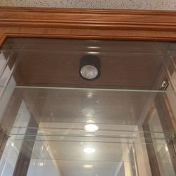 Curio Cabinet - Glass and wood Lighted Local pickup only