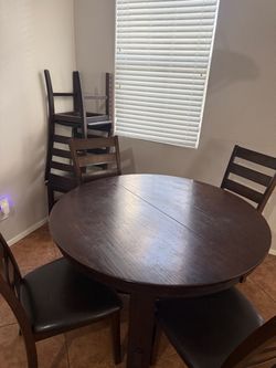 Dining Table ( RC Willey ) price firm