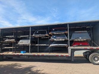 Come check out our huge selection of camper shells on display.