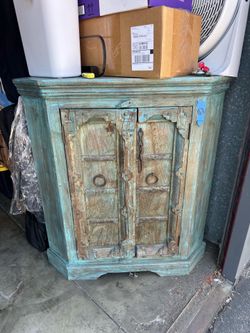 Rustic Hand-Carved Turquoise Corner Cabinet